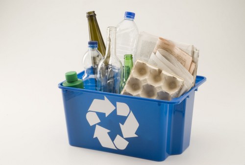 Rubbish removal team clearing household waste in Roehampton