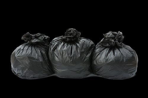 Waste clearance team removing household rubbish in Roehampton