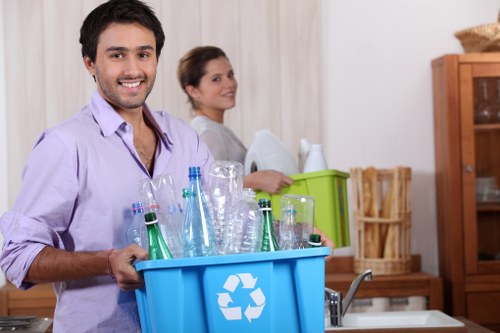 Shared housing recycling setup in Roehampton with clearly sorted bins