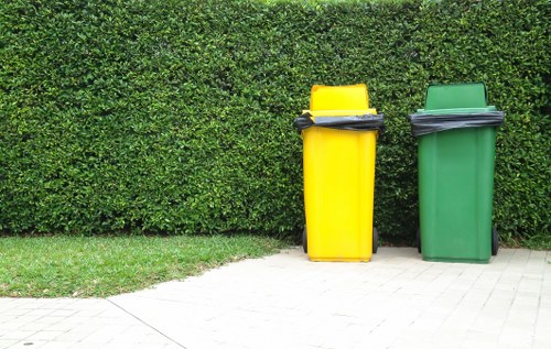 Professional rubbish removal crew working safely during a collection